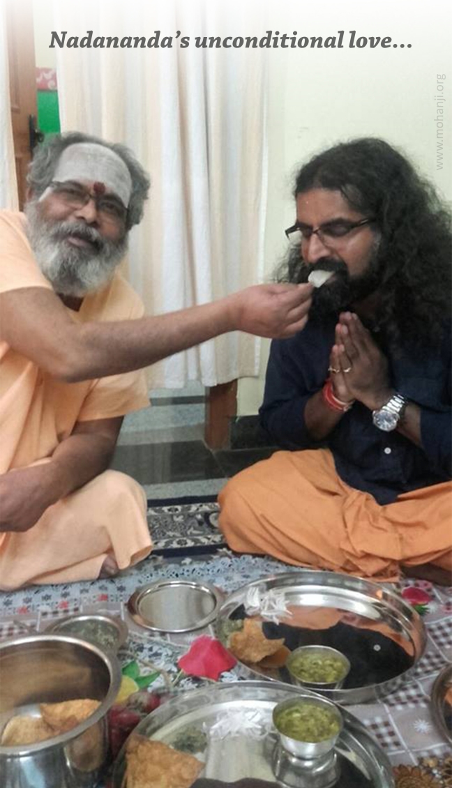 Nadanandaji feeding Mohanji like the Divine Mother.jpg